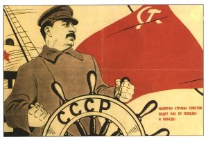 Joseph Stalin shown in a poster 'steering' the CCCP (USSR)